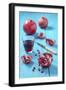 Whole and Sliced Pomegranate and Glass of Pomegranate Juice on Turquoise Wooden Table-Jana Ihle-Framed Photographic Print