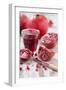 Whole and Sliced Pomegranates, Knives, Glass with Pomegranate Juice-Jana Ihle-Framed Photographic Print