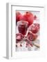 Whole and Sliced Pomegranates, Knives, Glass with Pomegranate Juice-Jana Ihle-Framed Photographic Print