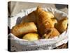 Wicker Basket with Croissants and Breads, Clos Des Iles, Le Brusc, Var, Cote d'Azur, France-Per Karlsson-Stretched Canvas