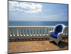 Wicker Chair and Tiled Terrace at the Hornet Dorset Primavera Hotel, Puerto Rico-Michele Molinari-Mounted Photographic Print