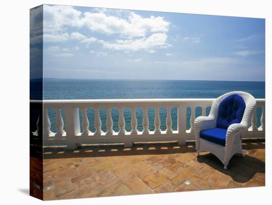 Wicker Chair and Tiled Terrace at the Hornet Dorset Primavera Hotel, Puerto Rico-Michele Molinari-Stretched Canvas