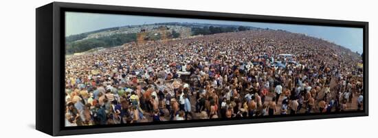 Wide Angle Overall of Huge Crowd Facing the Distant Stage, During the Woodstock Music and Art Fair-John Dominis-Framed Stretched Canvas