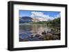 Wide angle shot of Capri Lagoon featuring Monte Fitz Roy in the background and rocks in the foregro-Fernando Carniel Machado-Framed Photographic Print