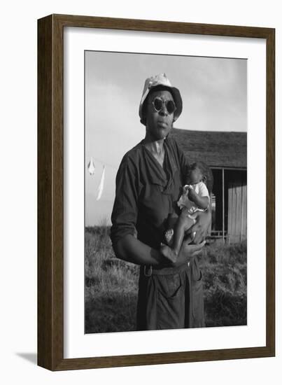 Wife and Child of Tractor Driver-Dorothea Lange-Framed Art Print