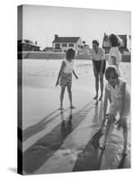 Wife of Project Mercury Astronaut, Mrs. Alan B. Shepard, Jr., Playing with Family on the Beach-null-Stretched Canvas