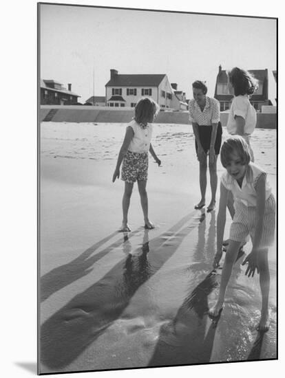 Wife of Project Mercury Astronaut, Mrs. Alan B. Shepard, Jr., Playing with Family on the Beach-null-Mounted Photographic Print