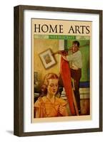 Wife Sews While a Man Hangs a Picture-null-Framed Art Print
