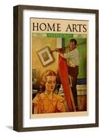 Wife Sews While a Man Hangs a Picture-null-Framed Art Print