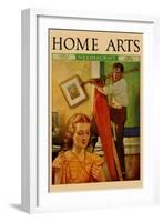 Wife Sews While a Man Hangs a Picture-null-Framed Art Print