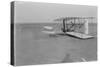 Wilbur Wright in damaged plane after unsuccesful flight Photograph - Kitty Hawk, NC-Lantern Press-Stretched Canvas