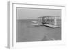 Wilbur Wright in damaged plane after unsuccesful flight Photograph - Kitty Hawk, NC-Lantern Press-Framed Art Print