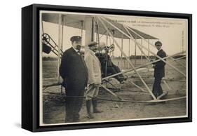 Wilbur Wright Makes a Last Minute Check Before Taking to the Air with a Passenger-null-Framed Stretched Canvas