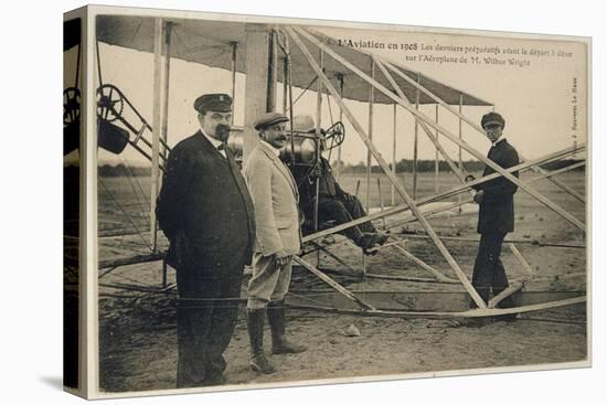 Wilbur Wright Makes a Last Minute Check Before Taking to the Air with a Passenger-null-Stretched Canvas