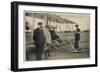 Wilbur Wright Makes a Last Minute Check Before Taking to the Air with a Passenger-null-Framed Art Print