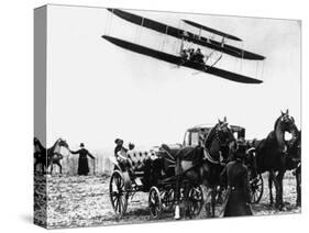 Wilbur Wright with His Plane in Flight at Pau in France, February 1909-null-Stretched Canvas