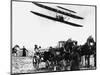 Wilbur Wright with His Plane in Flight at Pau in France, February 1909-null-Mounted Photographic Print