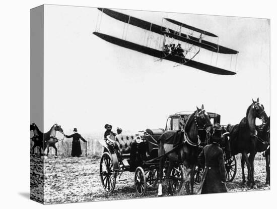 Wilbur Wright with His Plane in Flight at Pau in France, February 1909-null-Stretched Canvas