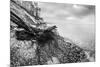 Wild Beach with Fallen Tree and Cliffs on a Winter, Cloudy Day. Waves on the Sea. Black and White.-Michal Bednarek-Mounted Photographic Print