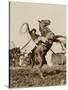 Wild West Show Performer Holds Aloft A Coiled Rope As His Horse Rears Up On His Hind Feet.-null-Stretched Canvas