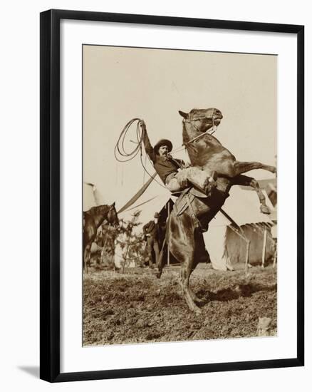 Wild West Show Performer Holds Aloft A Coiled Rope As His Horse Rears Up On His Hind Feet.-null-Framed Art Print