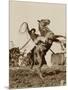 Wild West Show Performer Holds Aloft A Coiled Rope As His Horse Rears Up On His Hind Feet.-null-Mounted Art Print