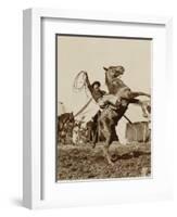 Wild West Show Performer Holds Aloft A Coiled Rope As His Horse Rears Up On His Hind Feet.-null-Framed Art Print