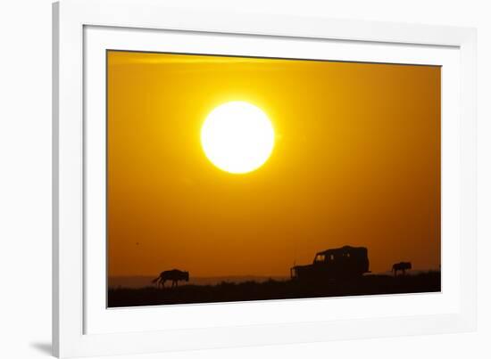 Wildebeest Near Safari Truck at Sunrise-Paul Souders-Framed Photographic Print