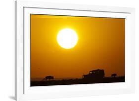 Wildebeest Near Safari Truck at Sunrise-Paul Souders-Framed Photographic Print