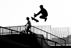 Skateboarder Jumping in a Bowl of a Skate Park-Will Rodrigues-Photographic Print