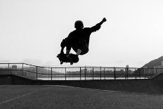 Skateboarder Jumping in a Bowl of a Skate Park-Will Rodrigues-Framed Photographic Print