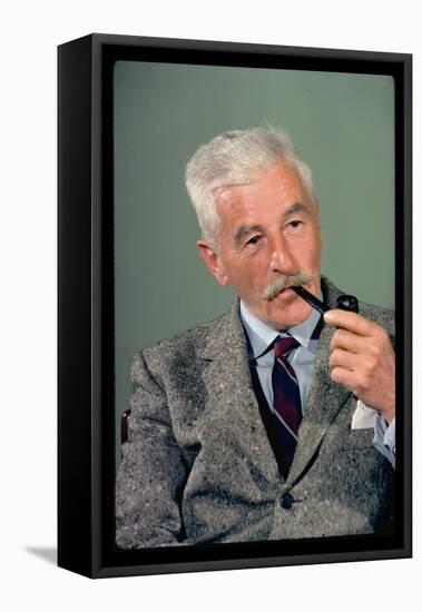 William Faulkner Smoking a Pipe-Carl Mydans-Framed Stretched Canvas