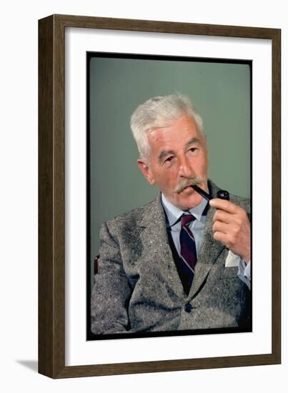 William Faulkner Smoking a Pipe-Carl Mydans-Framed Photographic Print