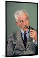 William Faulkner Smoking a Pipe-Carl Mydans-Mounted Photographic Print