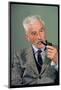 William Faulkner Smoking a Pipe-Carl Mydans-Mounted Photographic Print