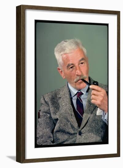 William Faulkner Smoking a Pipe-Carl Mydans-Framed Photographic Print