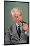 William Faulkner Smoking a Pipe-Carl Mydans-Mounted Photographic Print
