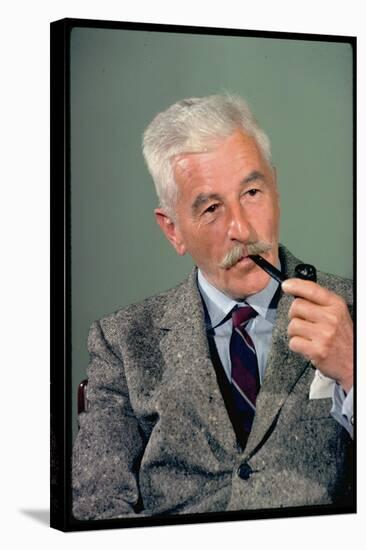 William Faulkner Smoking a Pipe-Carl Mydans-Stretched Canvas