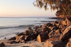 A Woman on a Stand-Up Paddleboard Heads Towards Main Beach, Noosa, at Sunset-William Gray-Photographic Print