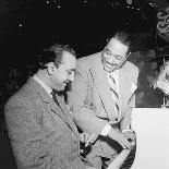 Django Reinhardt and David Rose at the Aquarium in New York City,1946-William Paul Gottlieb-Photographic Print