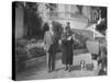 William Randolph Hearst and Mrs. Burton Holmes at San Simeon Estate with Boston Bull Terrier-William Davis-Stretched Canvas
