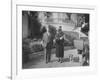 William Randolph Hearst and Mrs. Burton Holmes at San Simeon Estate with Boston Bull Terrier-William Davis-Framed Premium Photographic Print