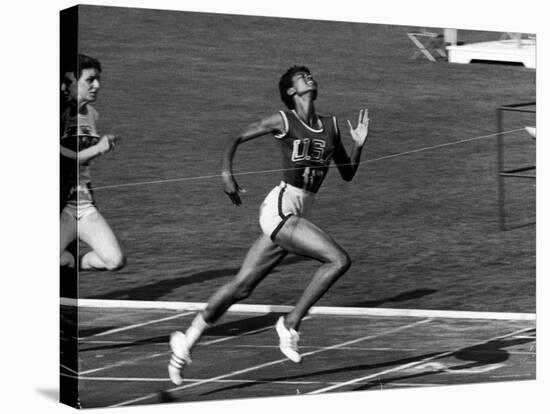 Wilma Rudolph, Across the Finish Line to Win One of Her 3 Gold Medals at the 1960 Summer Olympics-Mark Kauffman-Stretched Canvas