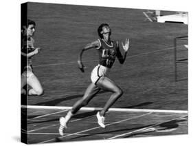 Wilma Rudolph, Across the Finish Line to Win One of Her 3 Gold Medals at the 1960 Summer Olympics-Mark Kauffman-Stretched Canvas