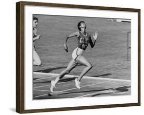 Wilma Rudolph, Across the Finish Line to Win One of Her 3 Gold Medals at the 1960 Summer Olympics-Mark Kauffman-Framed Premium Photographic Print