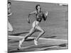 Wilma Rudolph, Across the Finish Line to Win One of Her 3 Gold Medals at the 1960 Summer Olympics-Mark Kauffman-Mounted Premium Photographic Print