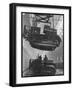 Winching a Tank with an Overhead Crane at a Factory in St. Petersburg-null-Framed Art Print