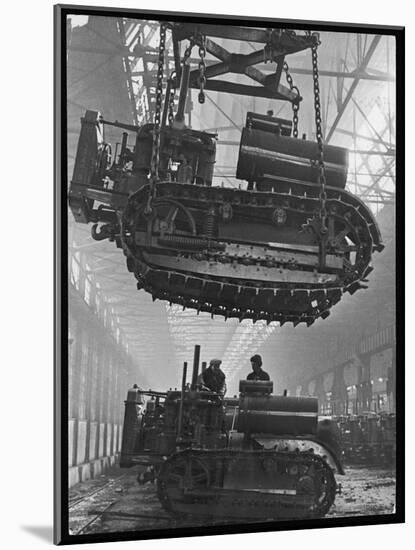 Winching a Tank with an Overhead Crane at a Factory in St. Petersburg-null-Mounted Art Print