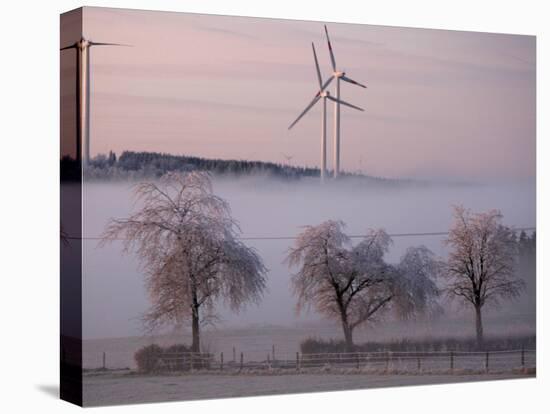 Wind Generators Stand on the Ridge of the Eifel Region Mountains Near Hallschlag, Germany-null-Stretched Canvas
