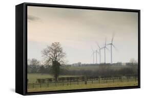 Wind Turbine a Row of Wind Turbines Producing Green Energy-null-Framed Stretched Canvas